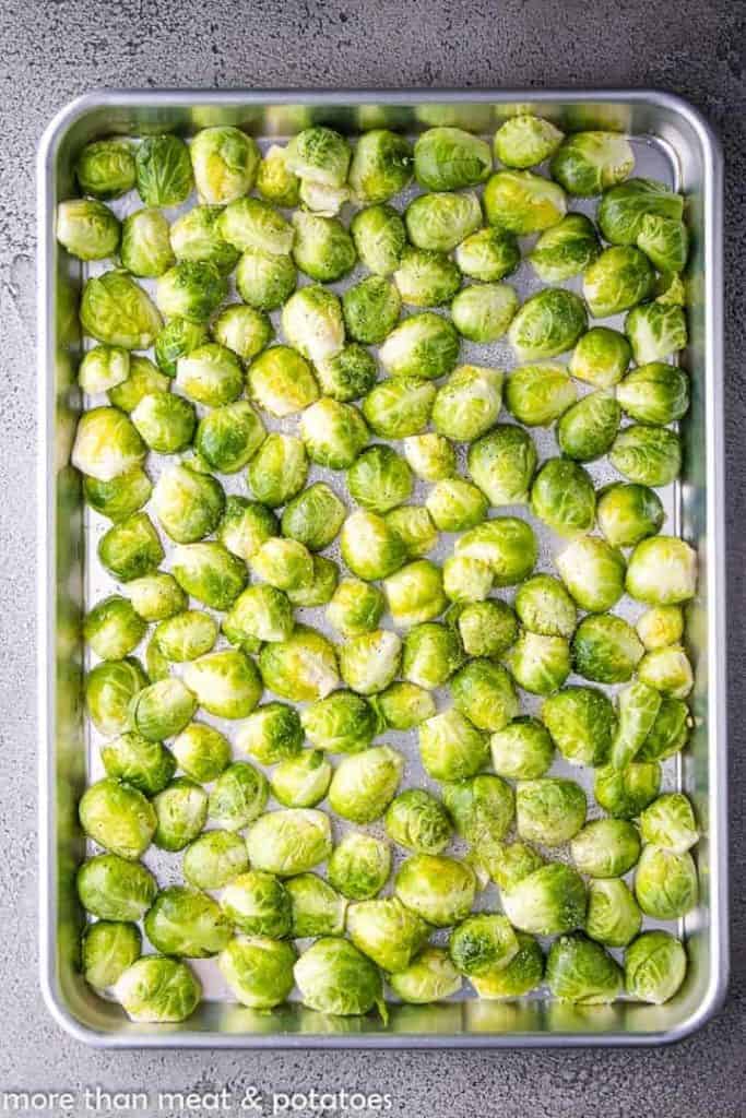 The sprouts have been transferred to a sheet pan.