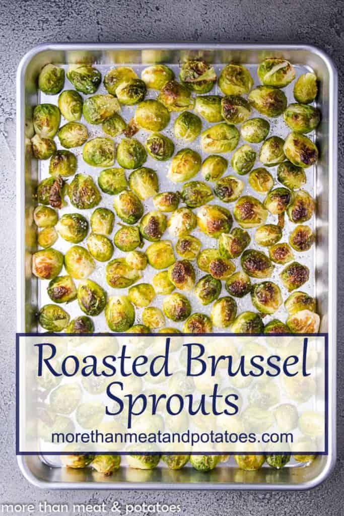 Roasted brussel sprouts on a sheet pan.