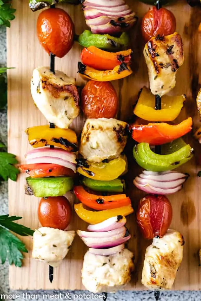 A close-up view of the colorful chicken kebabs.