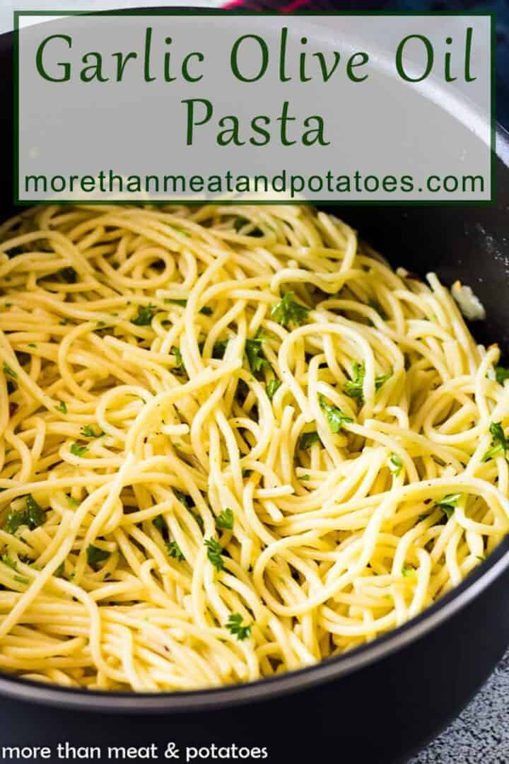 Roasted garlic and olive oil spaghetti in a pan.