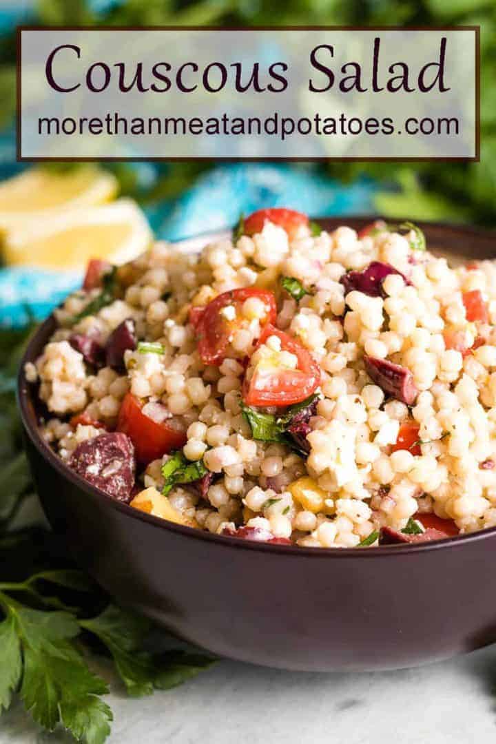 A close-up of the lemon couscous salad showing the tomatoes and olives.