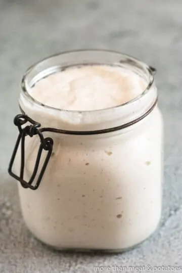 Active sourdough starter in a jar.