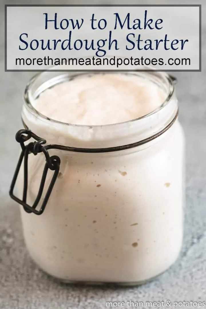 Sourdough starter in a glass jar that's starting to bubble.