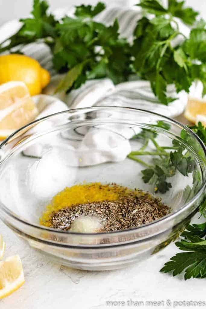 Lemon zest and other ingredients in a mixing bowl.