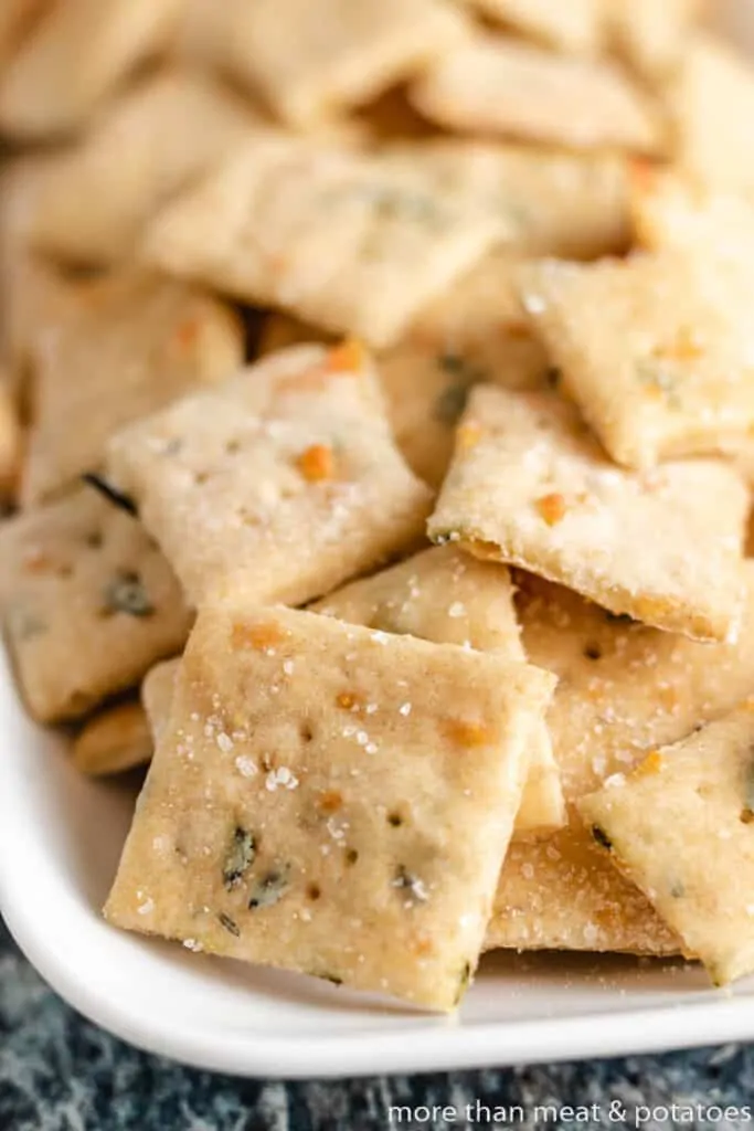 A closer view of the crackers to show the sea salt and herbs.