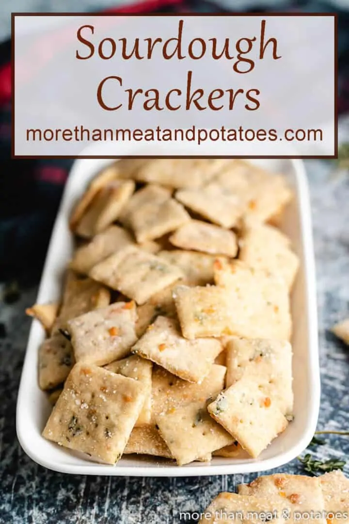 The sourdough crackers served on a long plate.