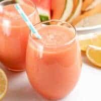 The finished watermelon cantaloupe juice in a glass.