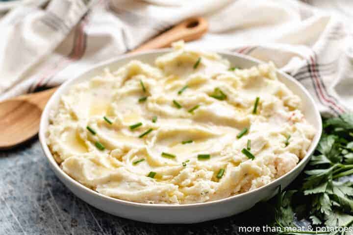 The lobster mashed potatoes topped with chives and melted butter.