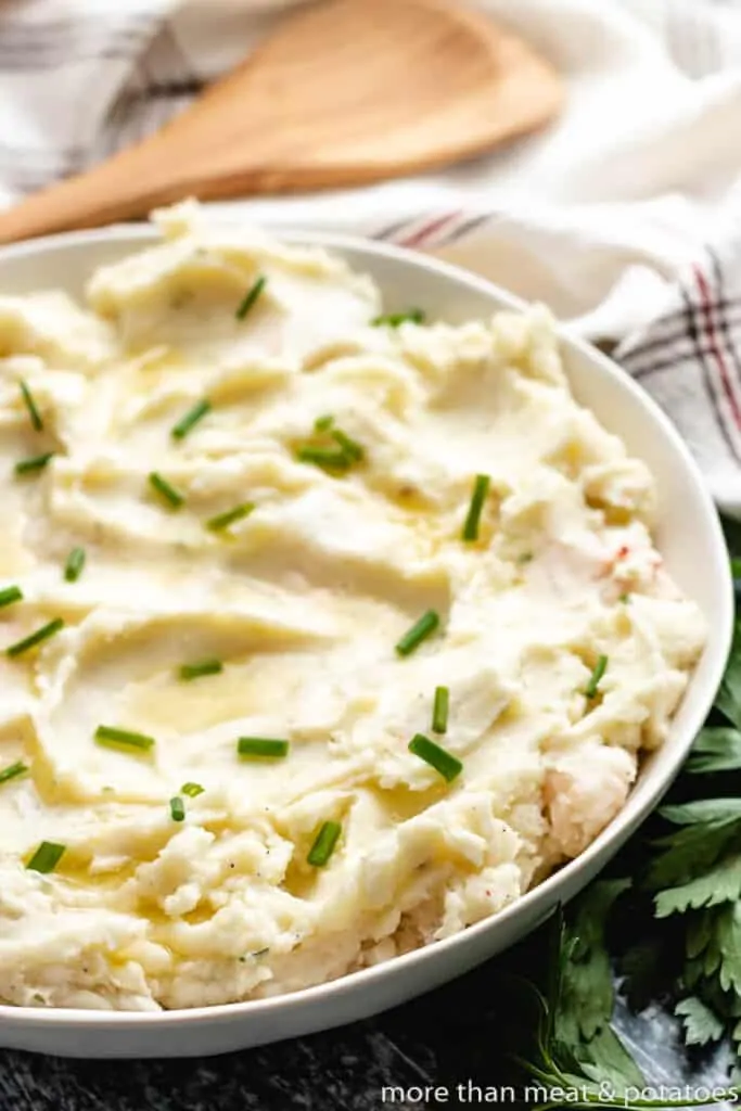 The finished potatoes served in a large bowl.