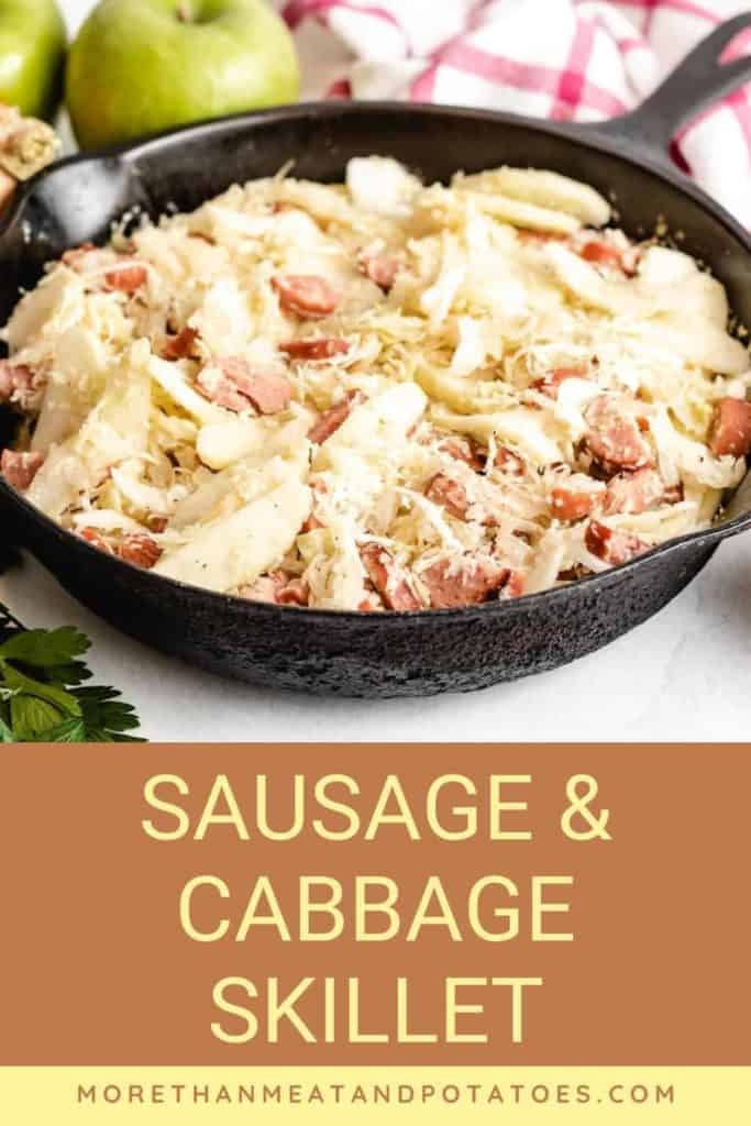 Sausage and cabbage cooked in a skillet.