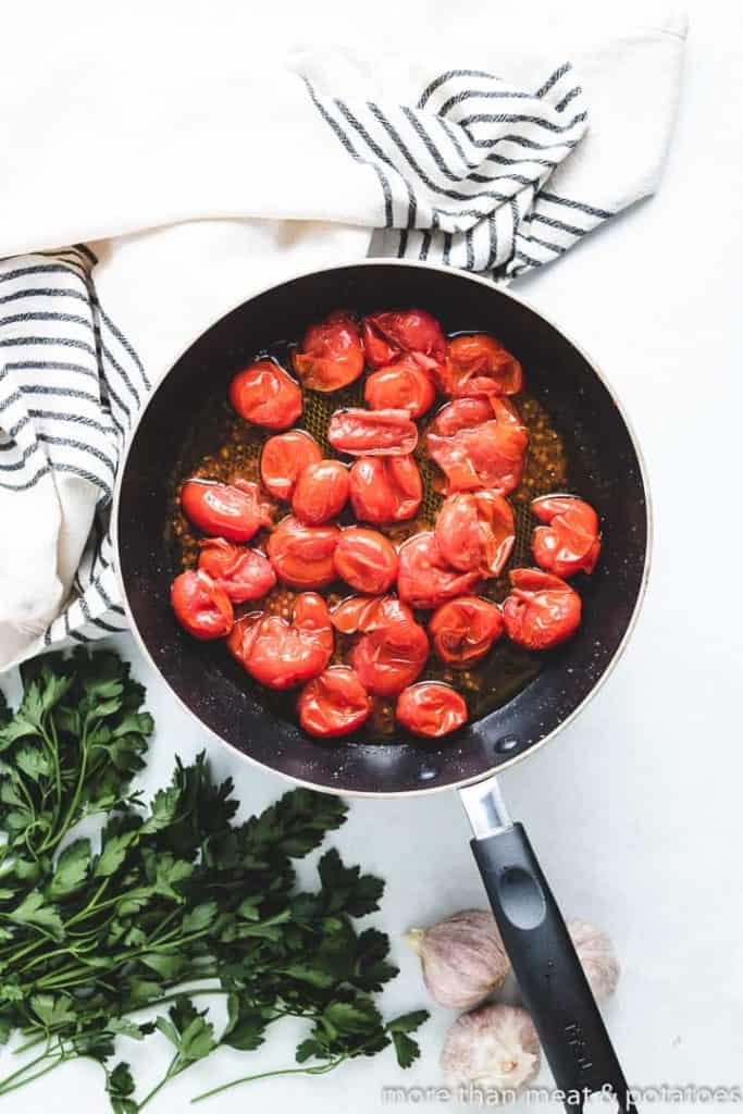 The crushed tomatoes have been cooked in oil.