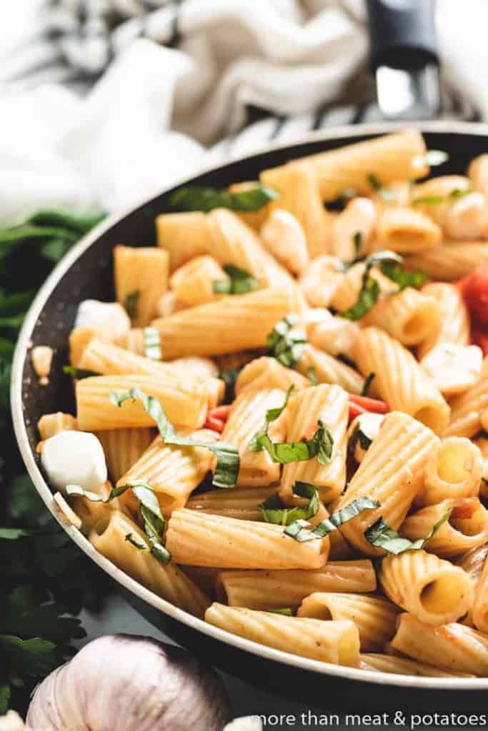 A close-up view of the pasta dinner in a pan.