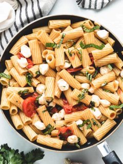 An aerial view of the rigatoni caprese in a pan.