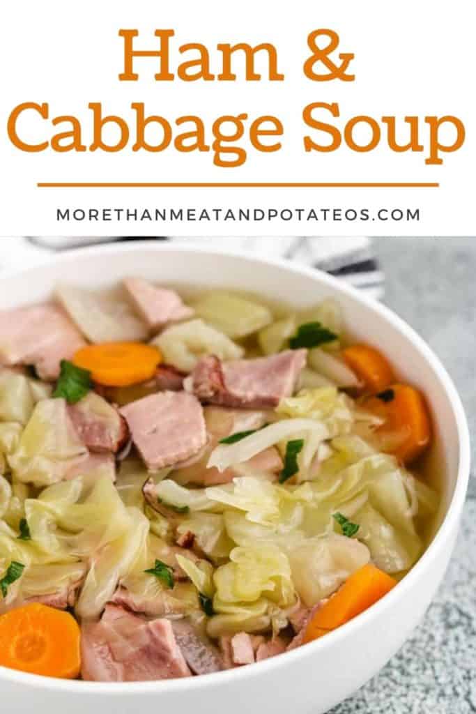 An up-close view of the ham and cabbage soup in a bowl.