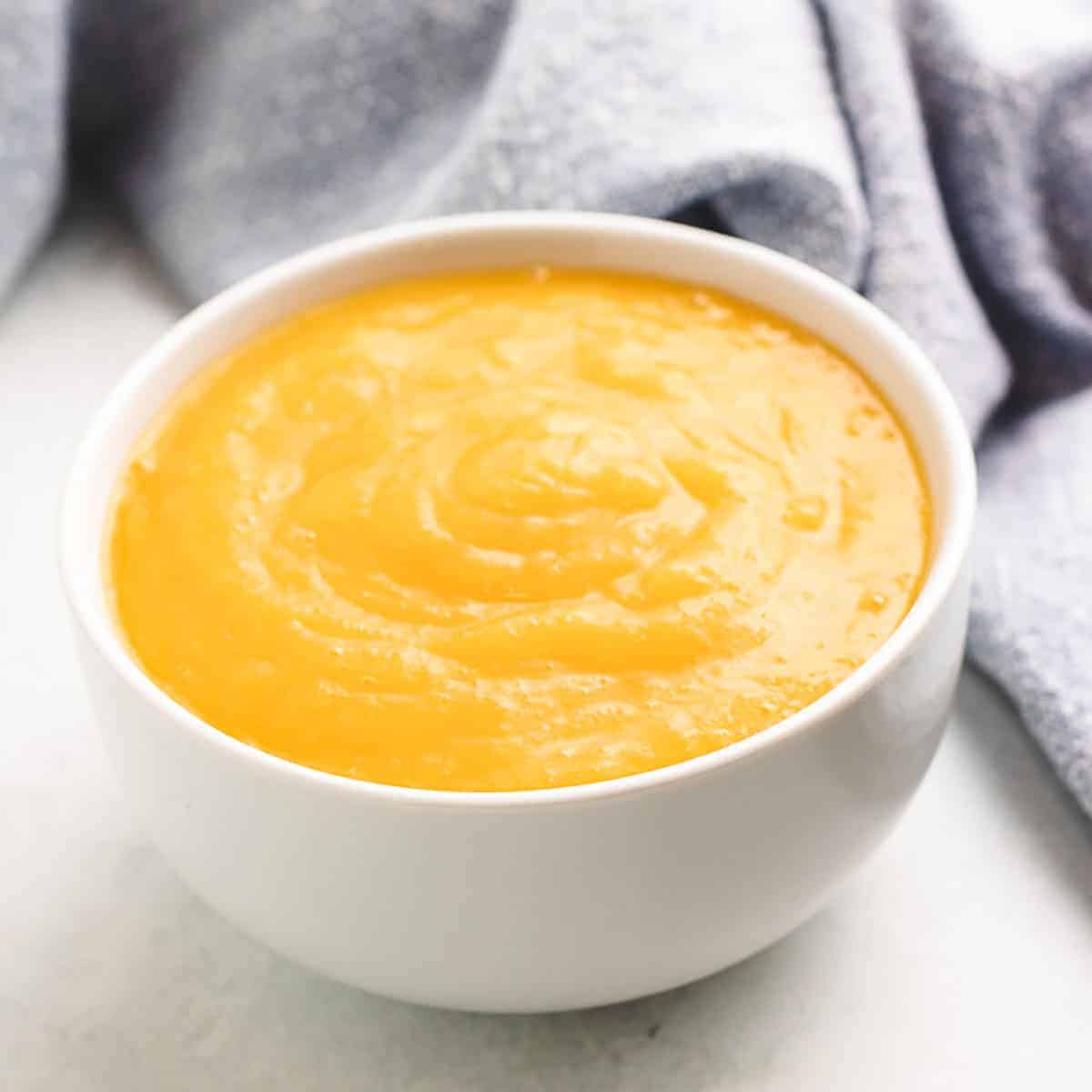 The finished mango puree in a bowl.