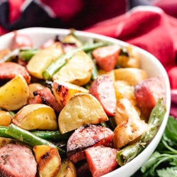 The roasted meat and vegetables in a bowl.