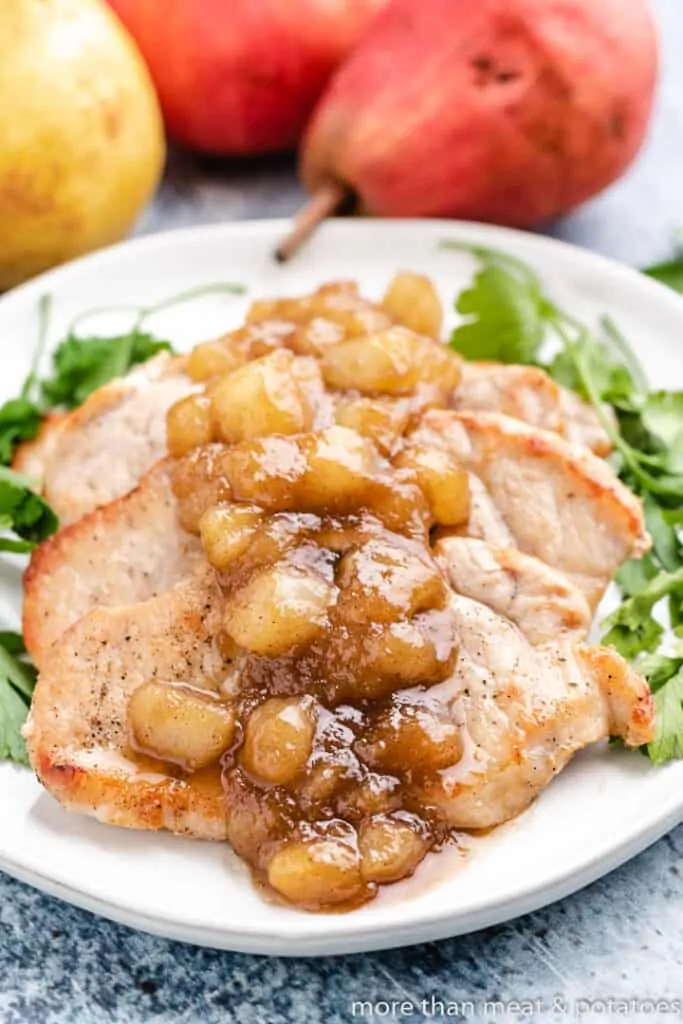 Warm pear topping served over cooked pork.