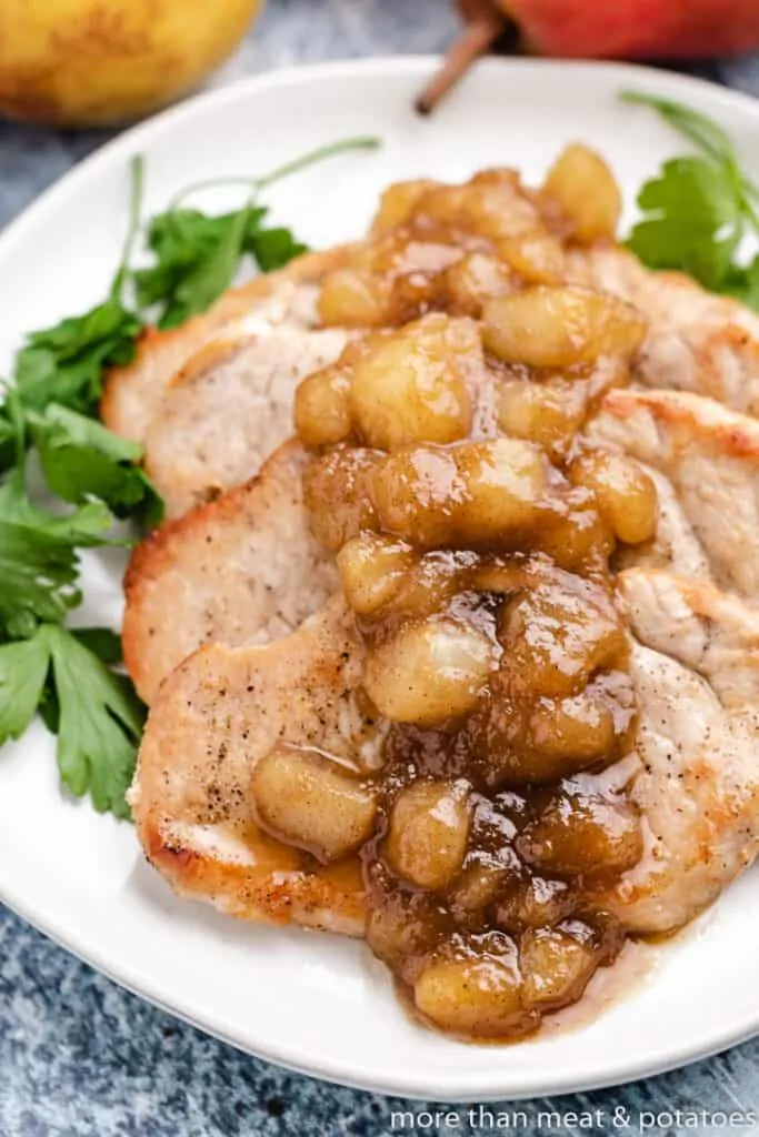 An aerial view of the pork cutlets and fruit topping.