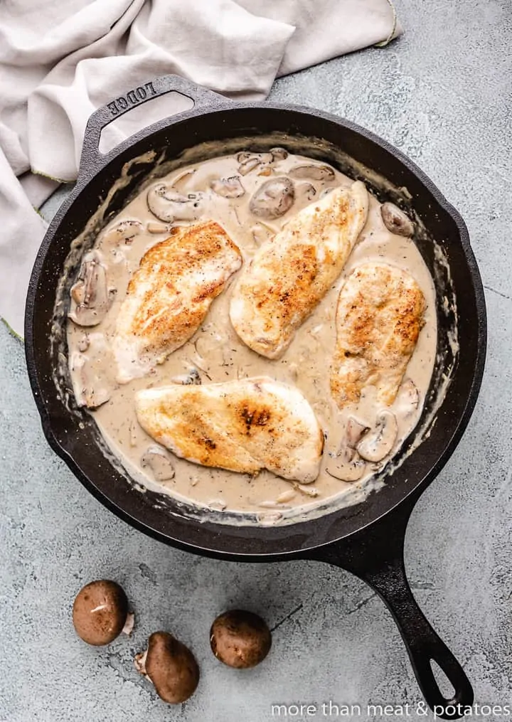 The cooked chicken add back to the skillet.