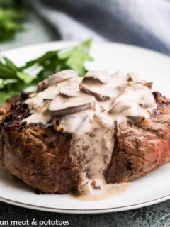 The creamy mushroom sauce poured over a steak.