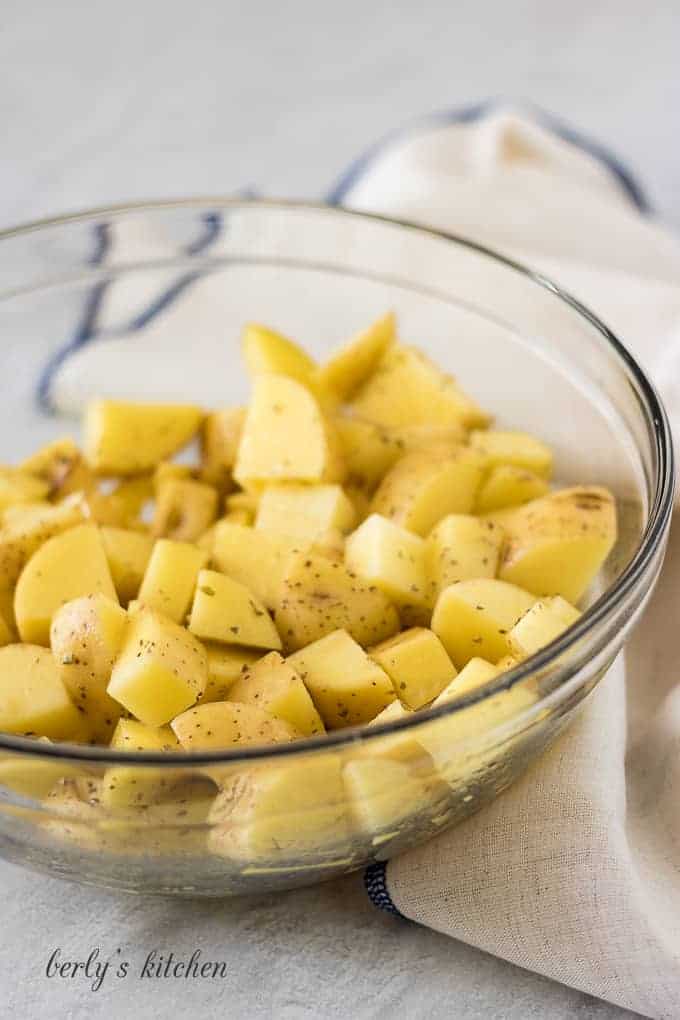 Potato Feta Salad Diced gold potatoes tossed with oil and spices.