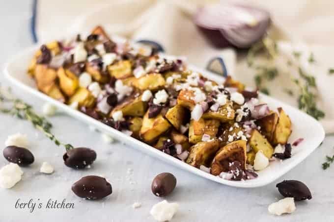 Potato Feta Salad The finished potato feta salad on a rectangular plate.