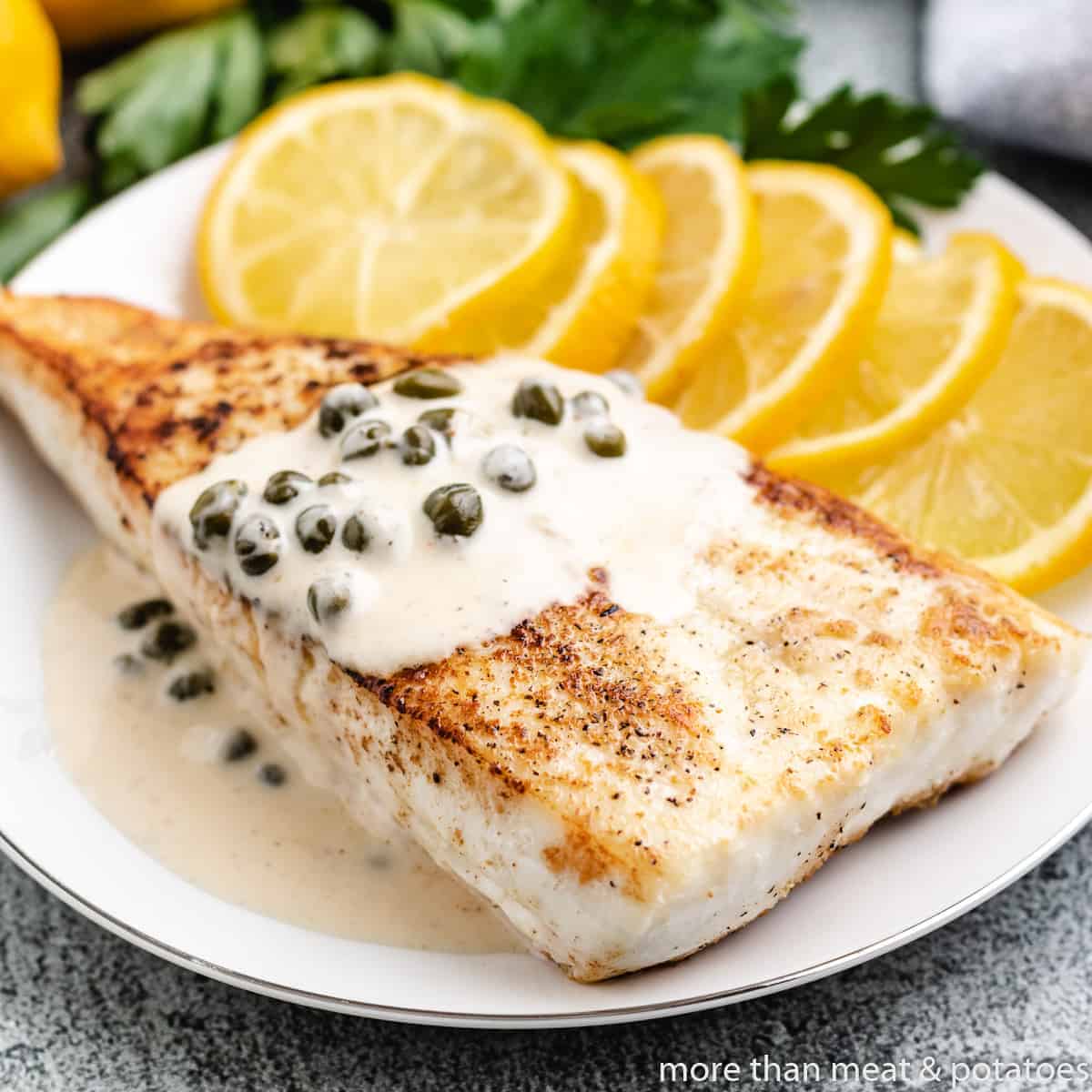Pan seared halibut served with lemon caper sauce.