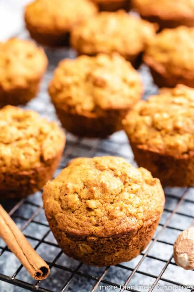 The finished pumpkin muffins on a cooling rack.