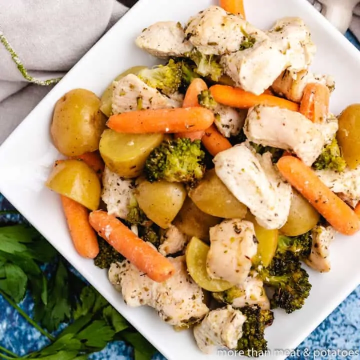 Top-down of chicken and veggies on a plate.