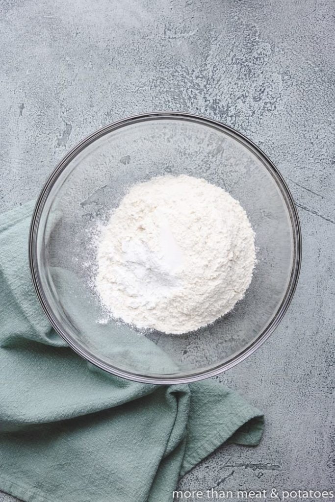 Baking powder and other ingredients combined in a bowl.