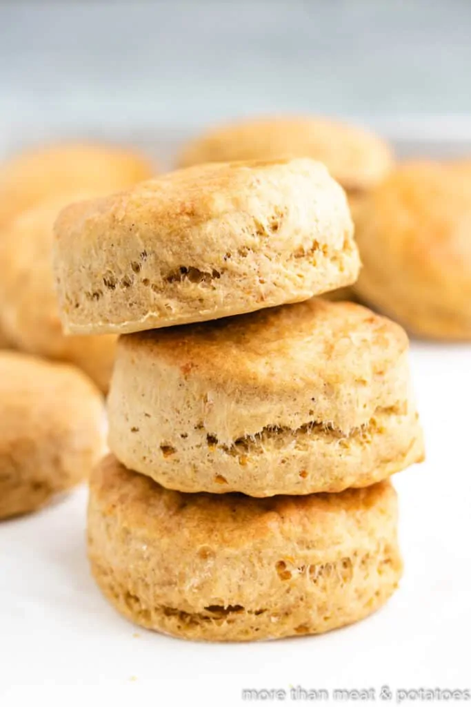 Three baked biscuits stacked on top of each other.