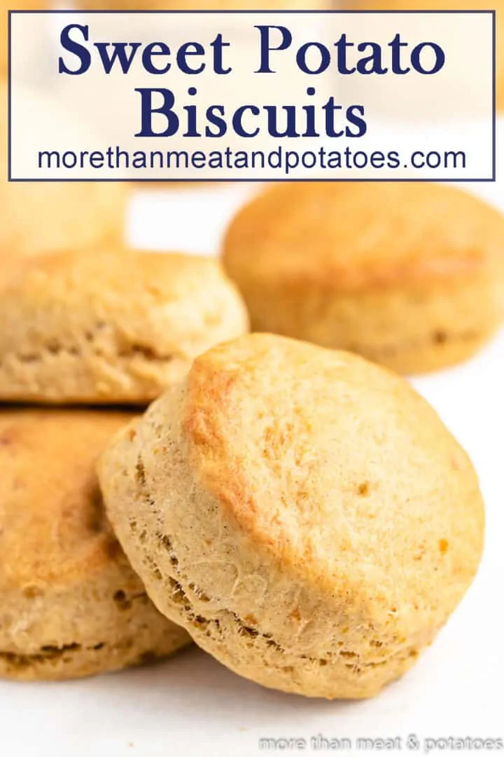 The fresh baked sweet potato biscuits on a counter.