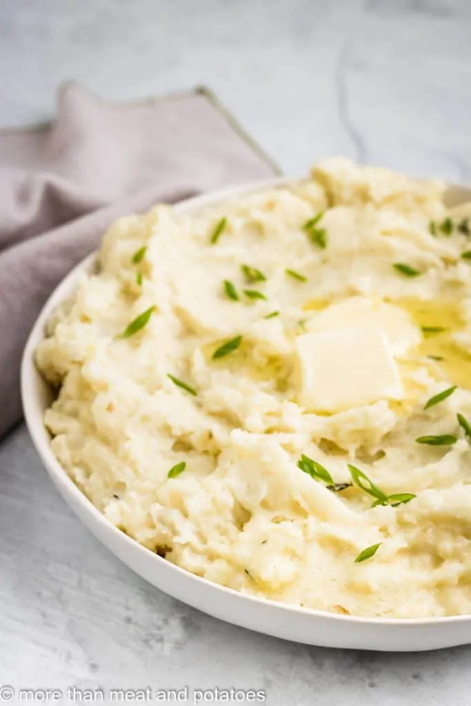 The finished potatoes served in a white bowl.