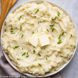 An aerial view of the brie mashed potatoes in a bowl.