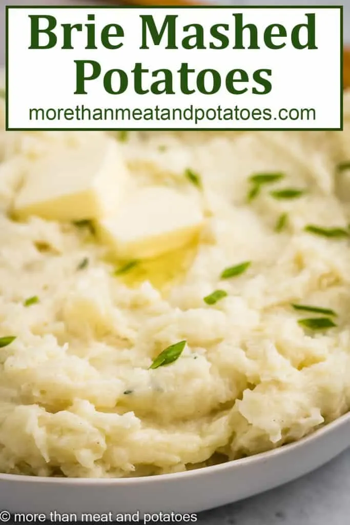 A close-up view of the brie mashed potatoes with butter.