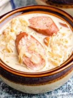 A close-up view of the sausage and sauerkraut soup.