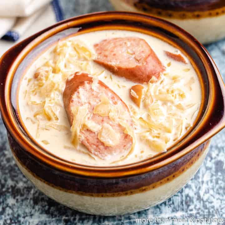 A close-up view of the sausage and sauerkraut soup.