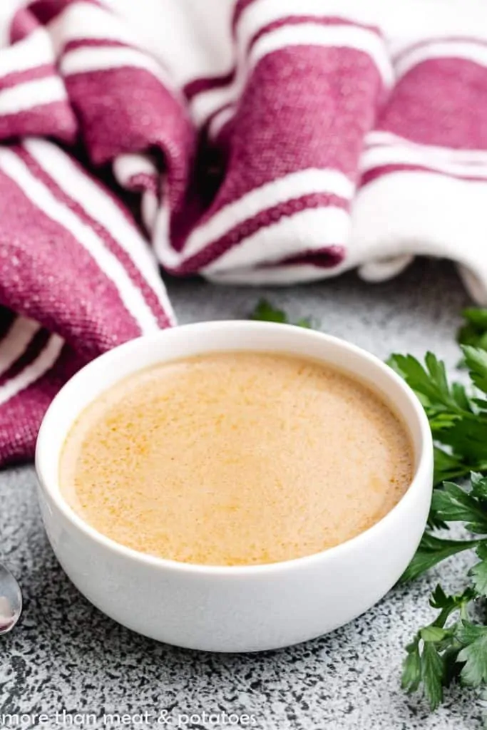 Tart, creamy gravy served in a white bowl.