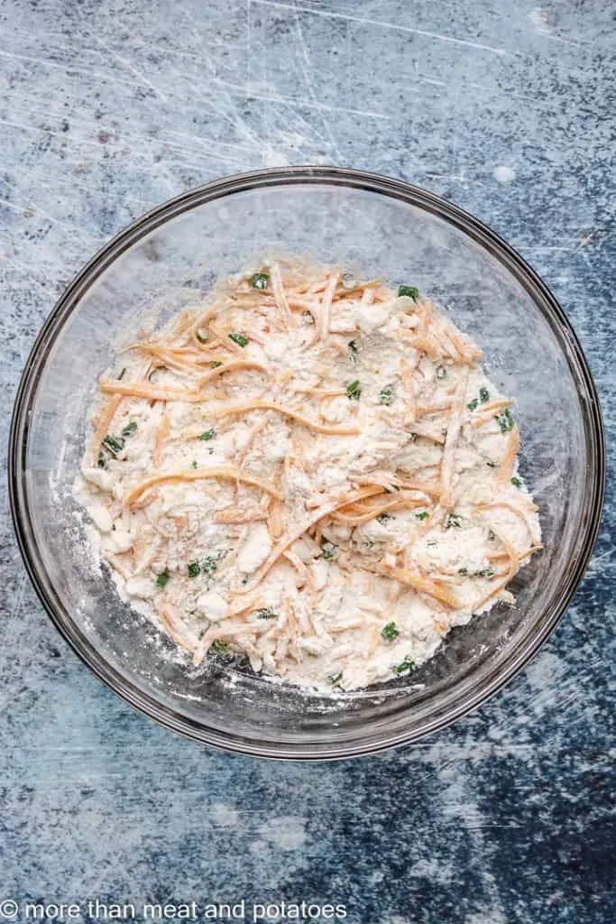 Cheese and chives added to the dry ingredients.