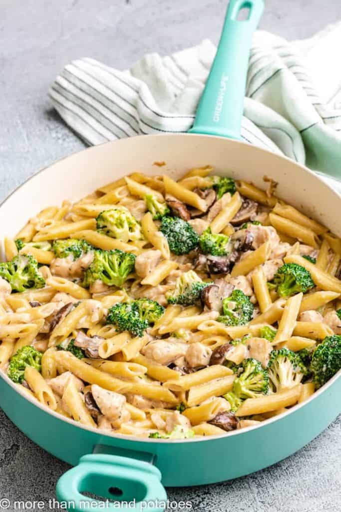 A different angle of the cooked pasta in a skillet.