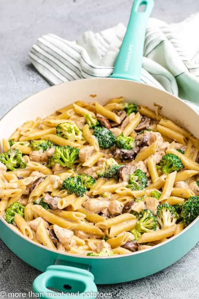 A different angle of the cooked pasta in a skillet.