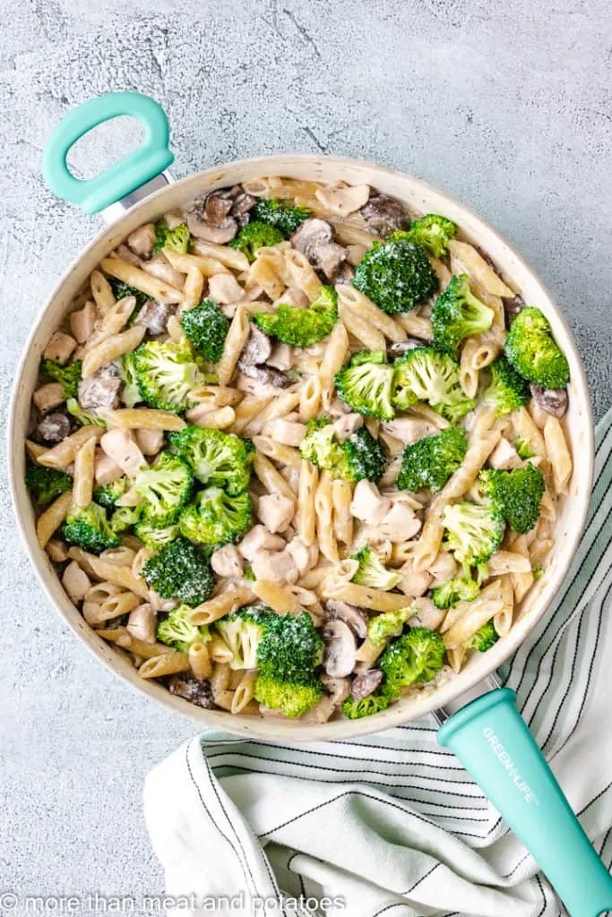 Fresh broccoli added to the skillet.