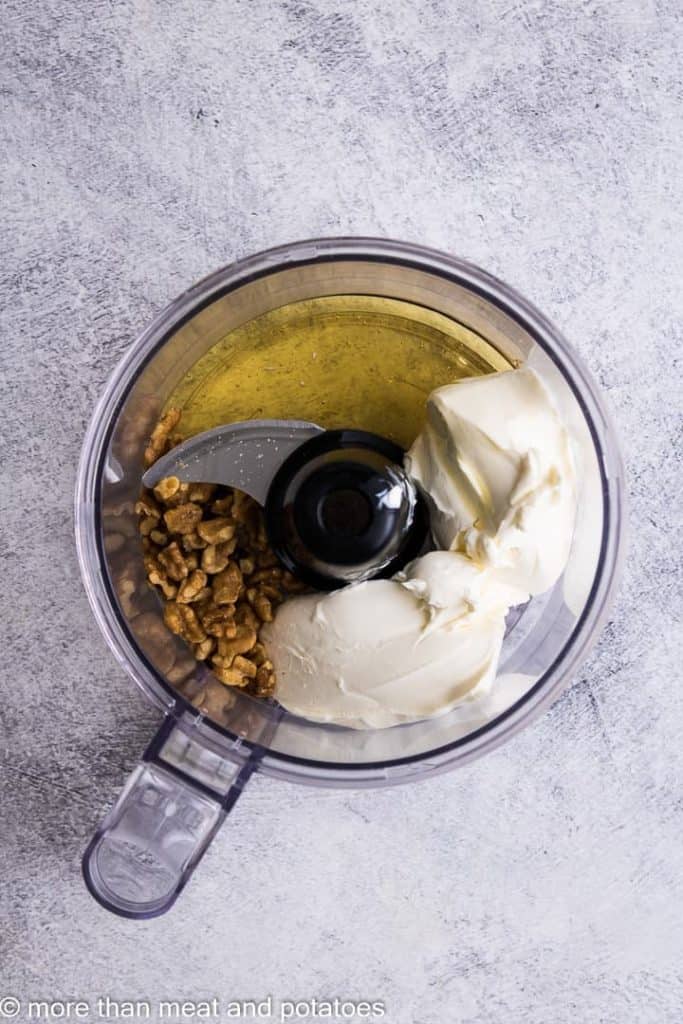 All of the ingredients placed into a food processor.