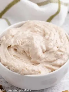 The finished honey walnut cream cheese in a bowl.