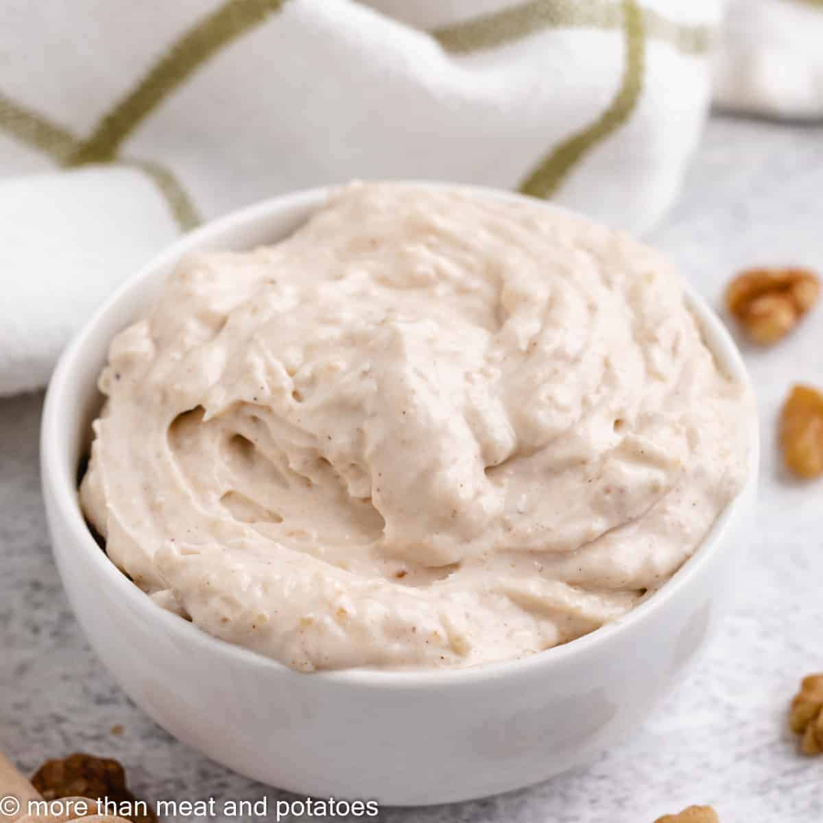 The finished honey walnut cream cheese in a bowl.