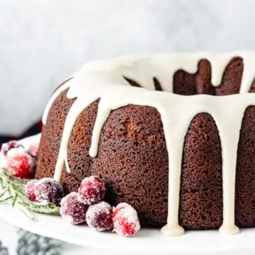 Bundt cake on a white cake stand.