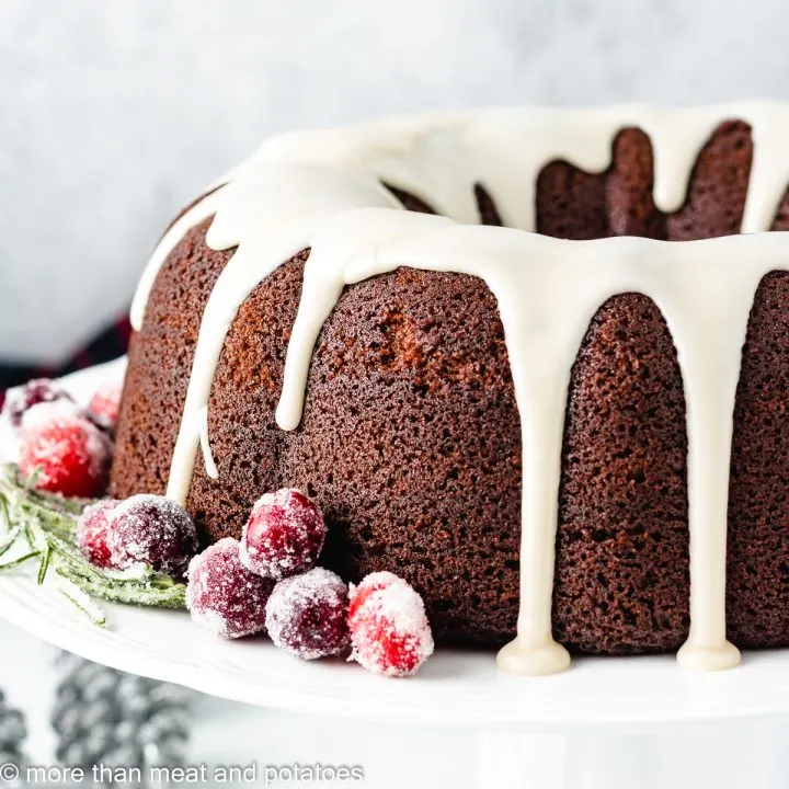 Cake with cranberries on a stand.