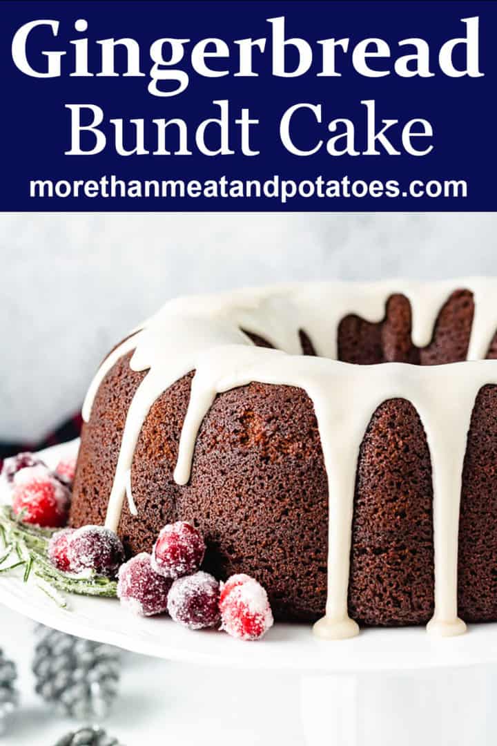 Gingerbread bundt cake on a white cake stand.