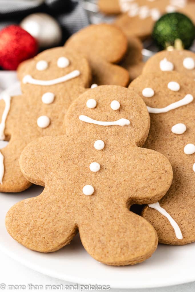 Decorated christmas cookies on a plate.