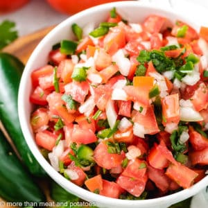 Top down photo of pico de gallo in a bowl.